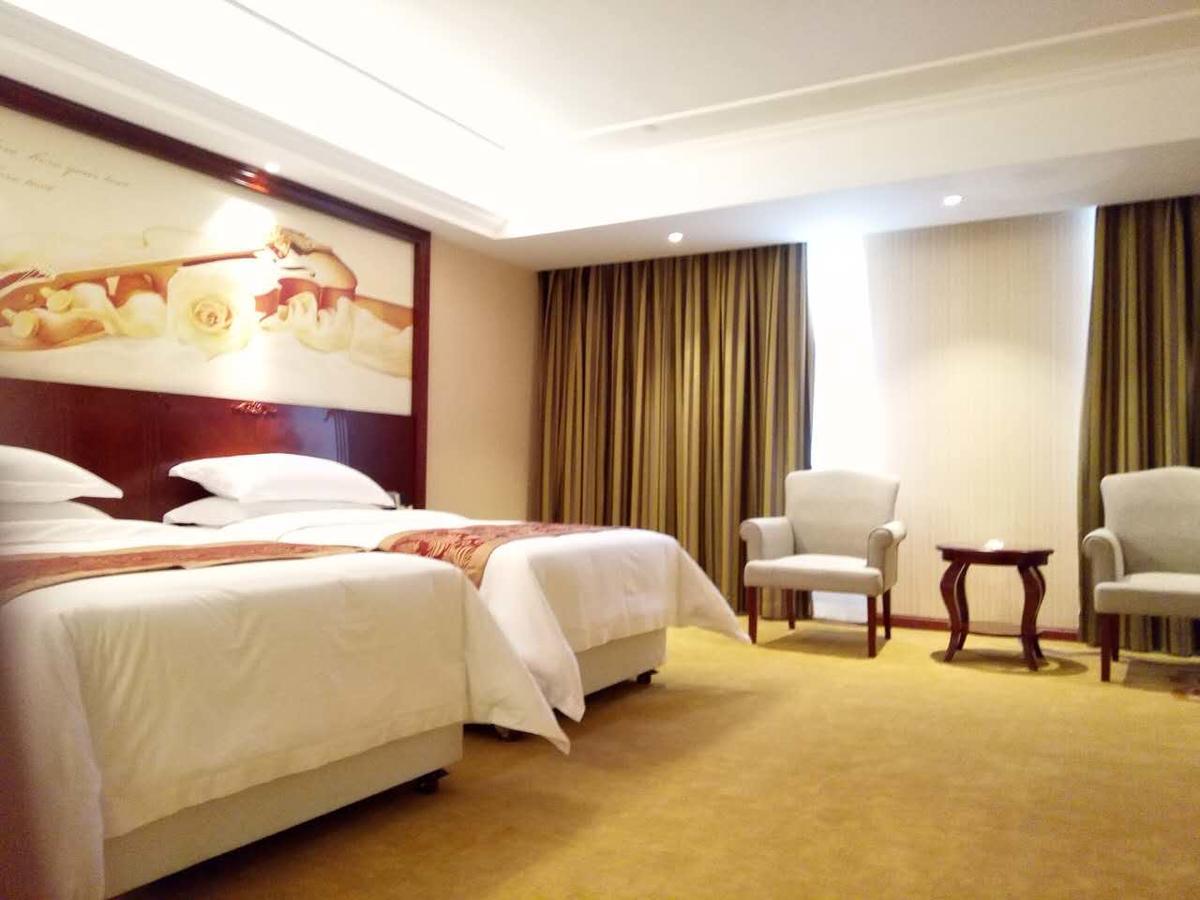 Vienna Hotel Zhongshan Guzhen Town Center Екстер'єр фото
